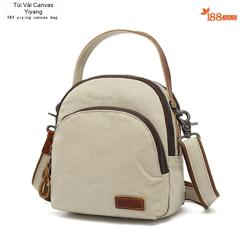 Balo Mini Nữ Vải Canvas Chống Nước Quai Da Thật Màu Nâu, Be