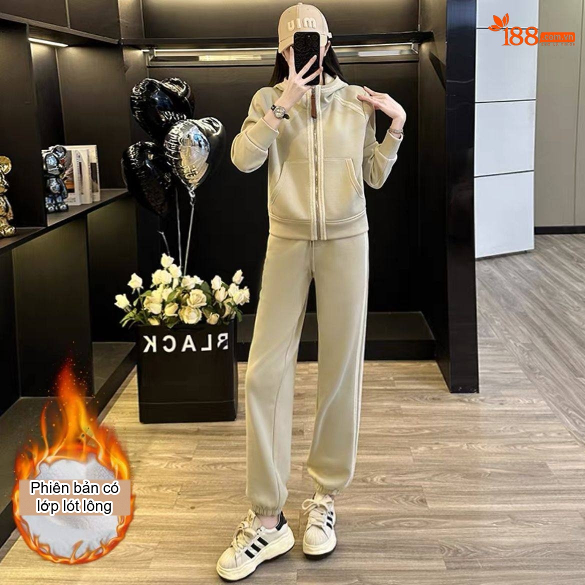 Bộ quần áo thể thao nữ dáng rộng có mũ lót lông