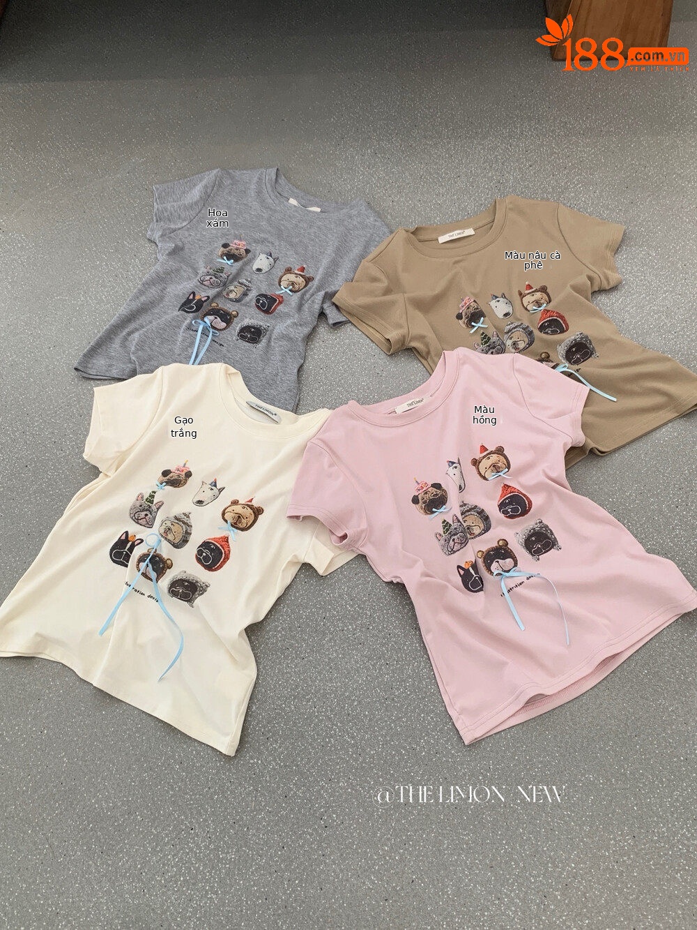 Áo thun nữ cổ tròn tay ngắn in hình chó con nơ hoa, phom vai vuông, phối màu pastel — trắng ngà, Màu cà phê, màu hồng, Xám hoa chi tiết 31