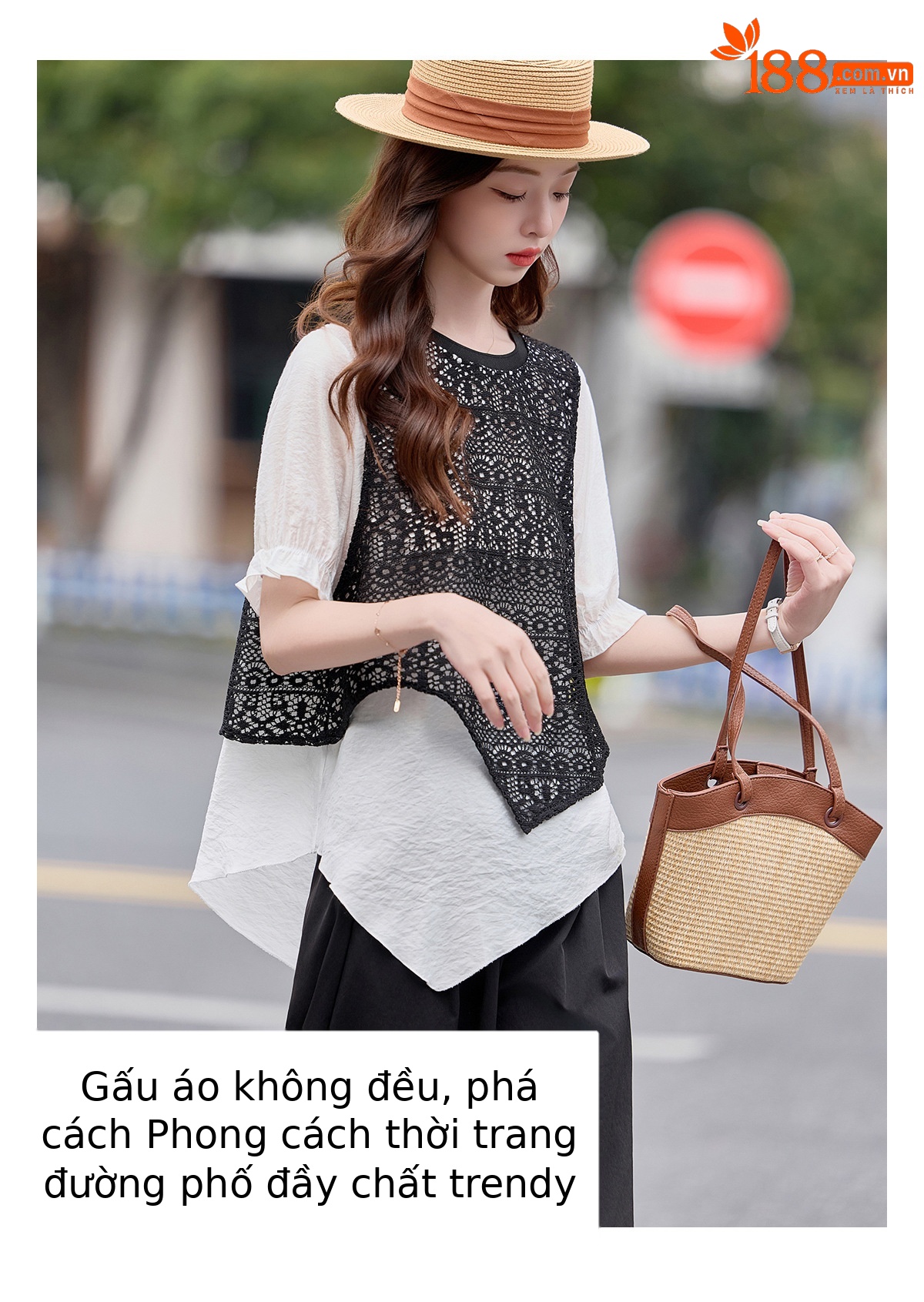 Bộ quần áo nữ mùa hè 2026 gồm áo thun phối ghép rộng và quần ống rộng cạp cao — màu đen chi tiết 2