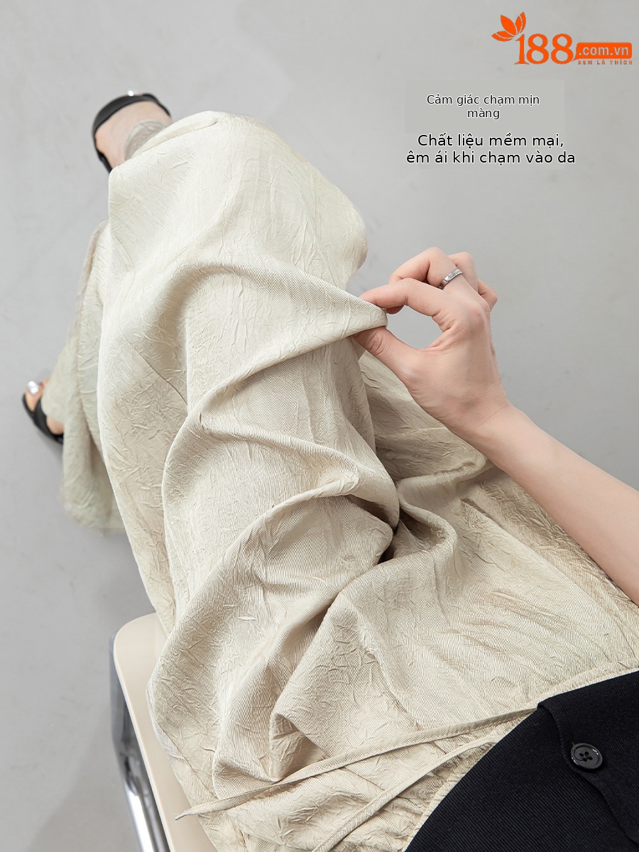Quần culottes nữ ống rộng chất liệu mềm mại, cạp chun, dáng suông rủ nhẹ — màu trắng ngà