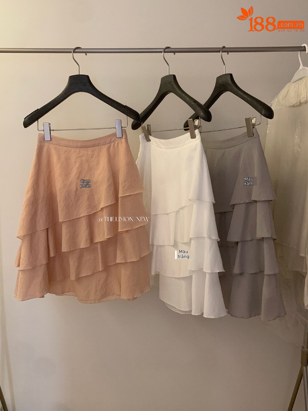 Chân váy midi xếp ly tầng bất đối xứng chất liệu Tencel — màu trắng, Bột cam, màu xám chi tiết 2