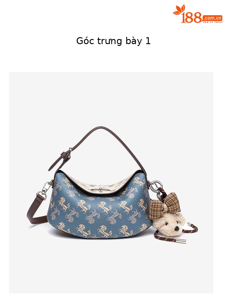 Túi đeo chéo nữ phong cách Hàn Quốc in họa tiết vintage, thiết kế hình túi vàng (yuanbao) – phiên bản mới xuân hè 2026, màu sắc tương phản thời trang chi tiết 11