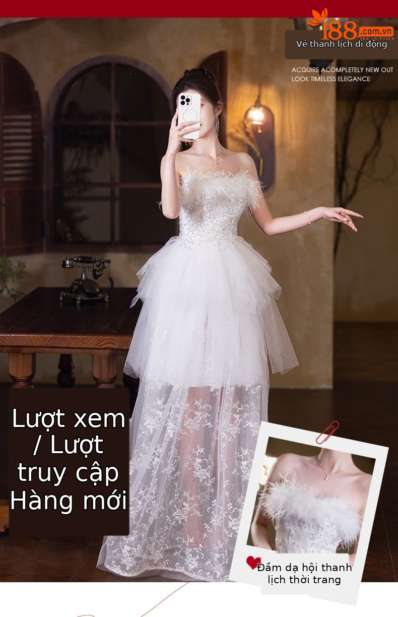 Đầm maxi nữ thắt eo cổ yếm phong cách Pháp, tay lỡ xếp tầng, phối lông vũ trang trí — Trắng chi tiết 1