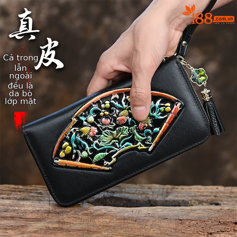 Ví cầm tay nữ da thật dáng dài dập nổi nhiều ngăn thẻ — Màu vàng