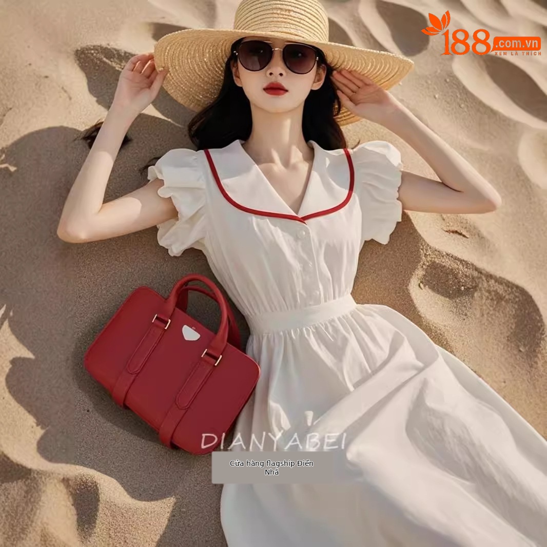 Váy maxi nữ thắt eo cổ yếm họa tiết tương phản phong cách biển — màu trắng